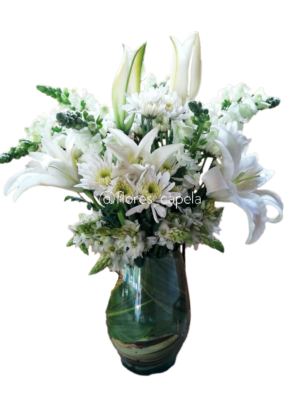 WhatsApp Image 2025-06-22 at 1.39.37 PM (1)letra Diseño en florero con lirios, margaritas y estrella de belén.